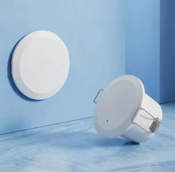 Radar presence sensor: small white ceiling-mounted detector